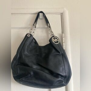 Michael Kors Black Hobo Bag with Silver Accents
